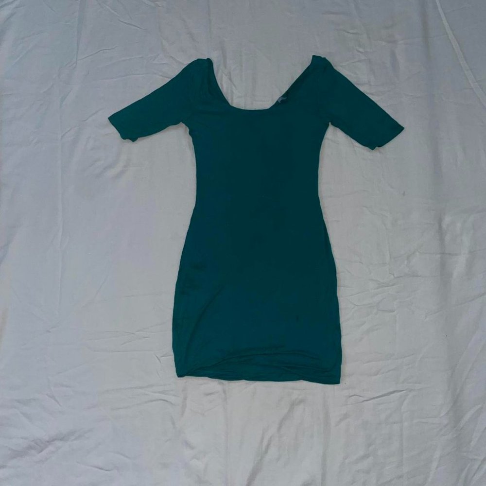 Turquoise body con dress with cross back in design size small